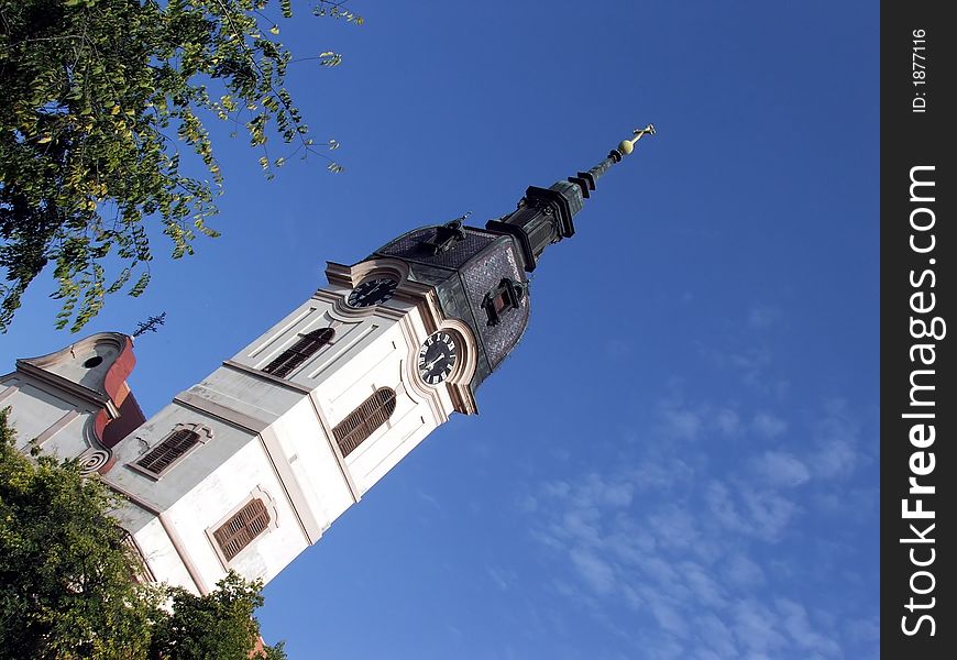 Sombor catholic church tower on the blue sky. Sombor catholic church tower on the blue sky