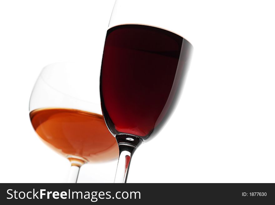 Two glass of red and pink wine. Isolated white. Two glass of red and pink wine. Isolated white.