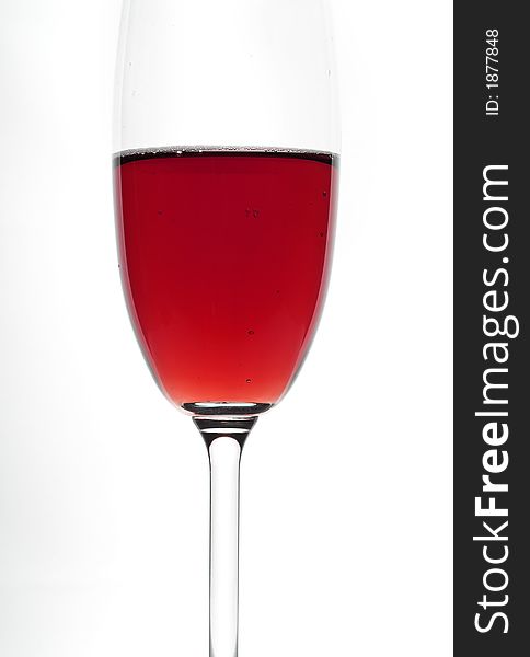 Glass of red wine. Isolated white. Close-up. Glass of red wine. Isolated white. Close-up.