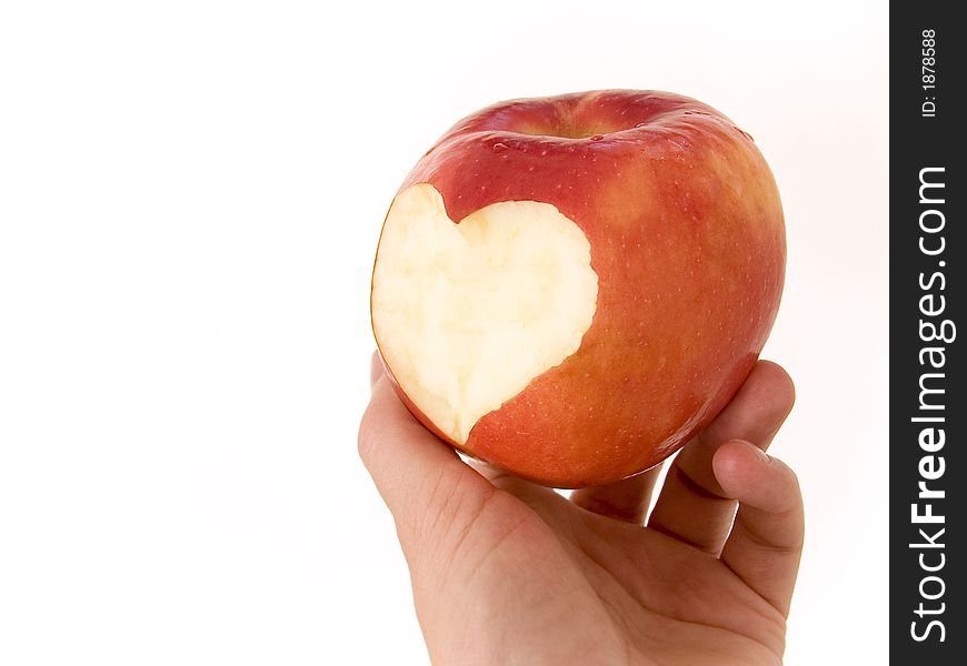 Bitten heart in an apple. Bitten heart in an apple