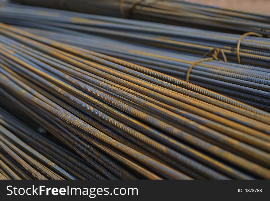 Image of bundles of metal bars, taken at a construction site