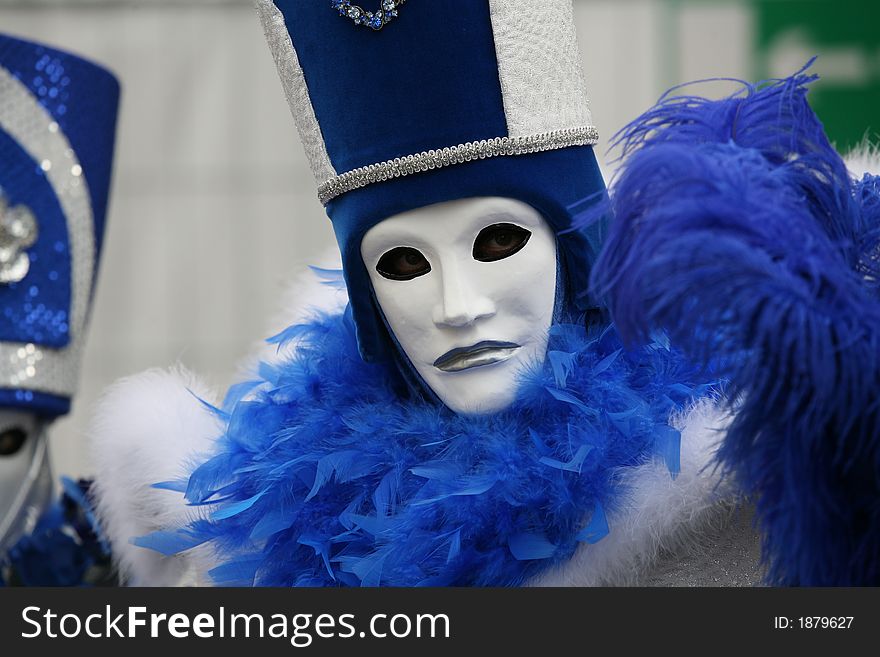 A venice carnival mask in blue and white. A venice carnival mask in blue and white.