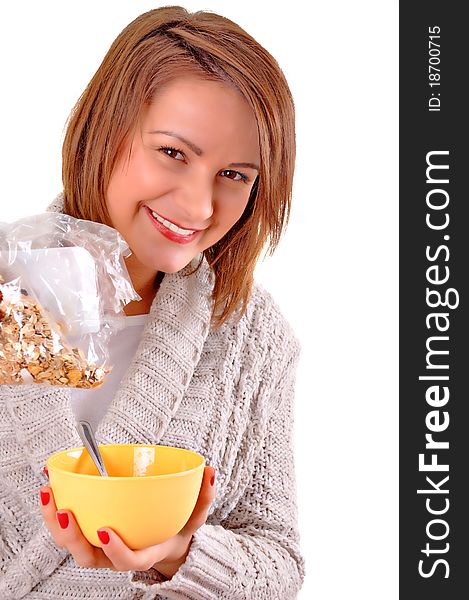 Happy young woman eating cereals