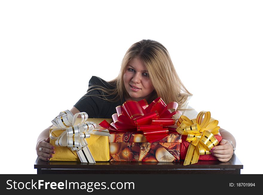 The woman on a holiday is filled up by gifts. The woman on a holiday is filled up by gifts