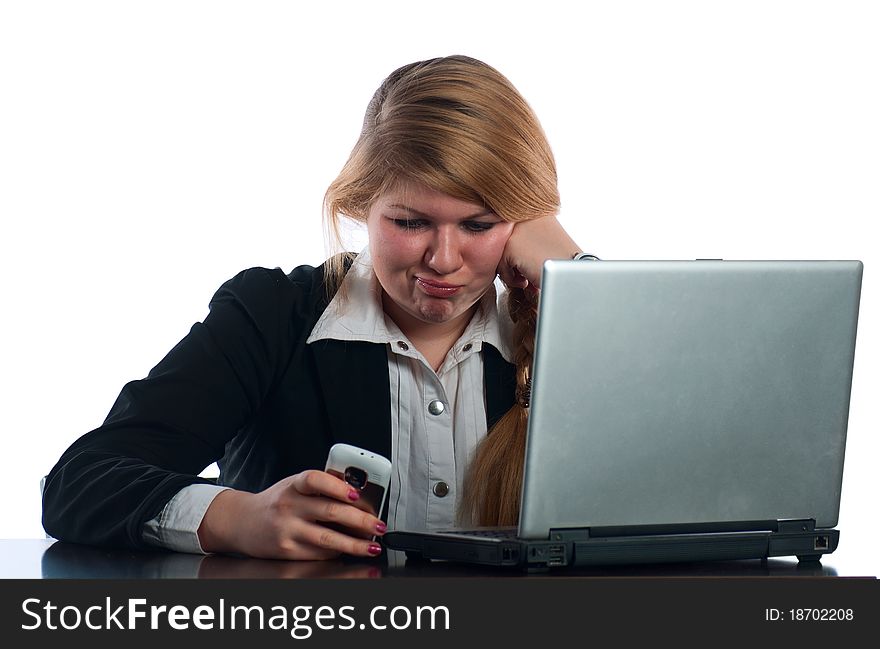 The businesswoman works at the computer at office