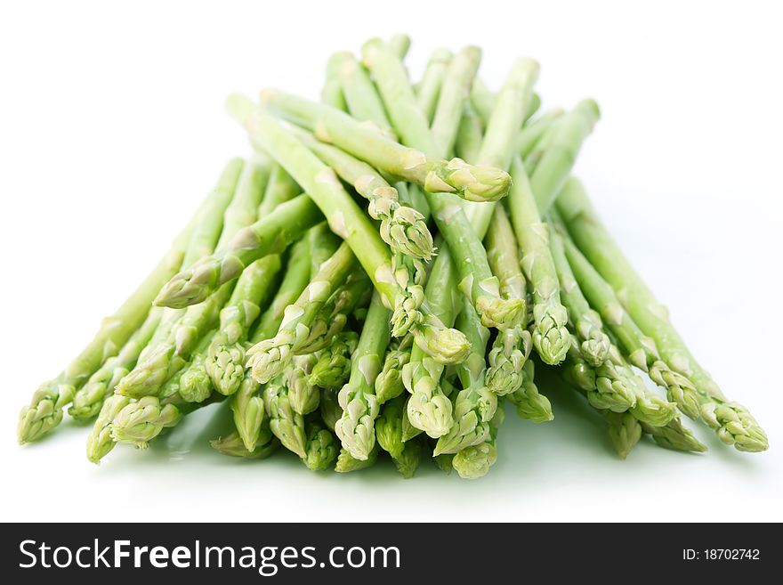 Sheaf of asparagus on a white background.