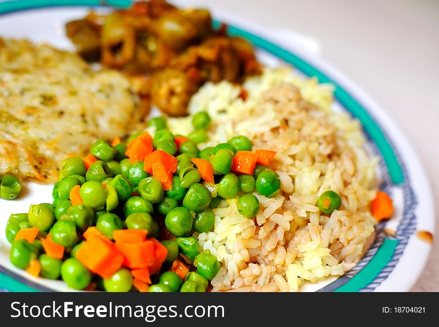 Healthy and balanced diet of seasoned fried rice, colorful peas and other ingredients. Healthy and balanced diet of seasoned fried rice, colorful peas and other ingredients.