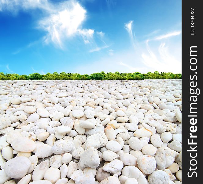 Pebble stack and sea waves on the background. Pebble stack and sea waves on the background