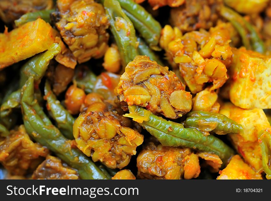 Fermented bean cuisine cooked in spicy dry sauce with a variety of vegetables. Fermented bean cuisine cooked in spicy dry sauce with a variety of vegetables.