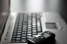 Keyboard And Mobile Phone Stock Images