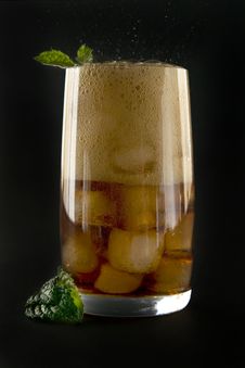 Glass With Cola Ice And Mint. Stock Photography Glass With Cola Ice And Mint. Stock Photography