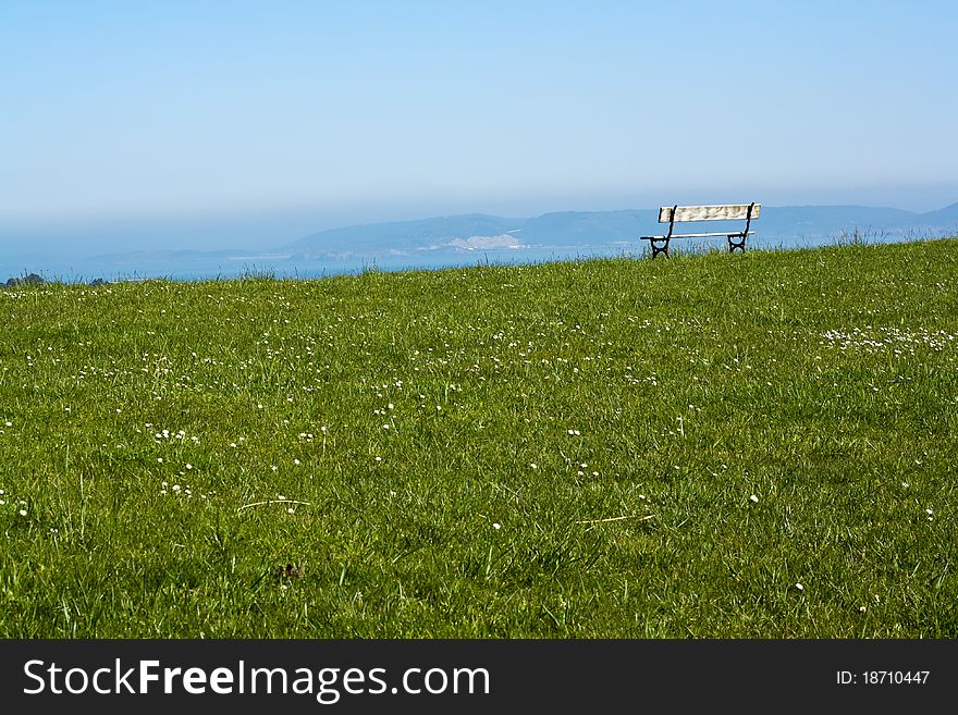 Bench by the ocean, a place for relaxation and meditation. Bench by the ocean, a place for relaxation and meditation