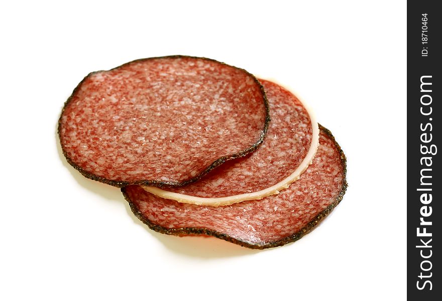 Salami slice isolated on white background