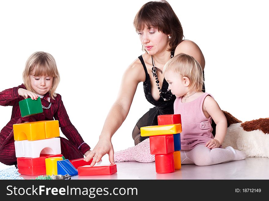 Children With Mother Playing With Blocks