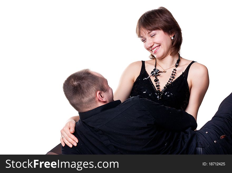 Portrait of a beautiful young happy smiling couple isolated on white