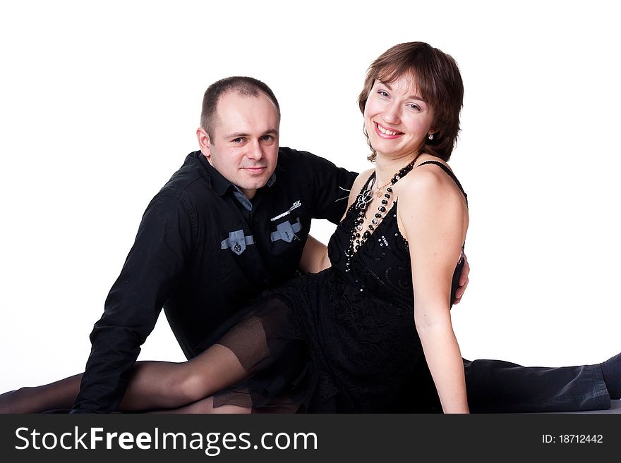 Portrait of a beautiful young happy smiling couple isolated on white