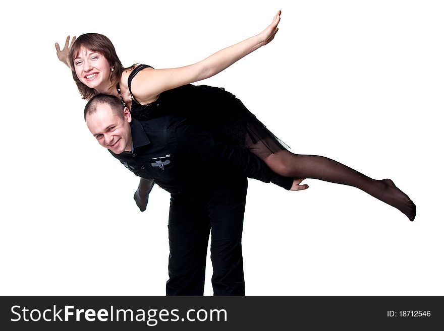 Portrait of a beautiful young happy smiling couple isolated on white