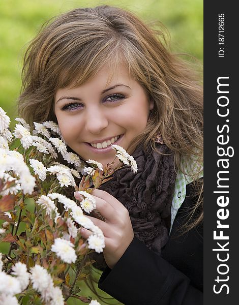 Portrait of beautiful young girl outdoors in autumn. Portrait of beautiful young girl outdoors in autumn