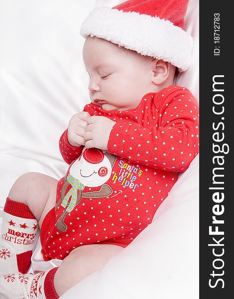 Two months old boy dressed in red. Two months old boy dressed in red