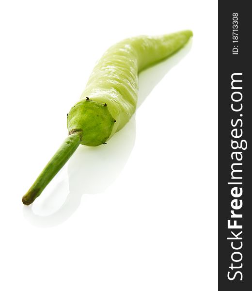 Fresh green chilly on white background