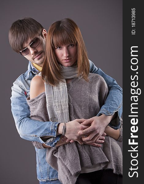 Fashion embracing couple in new spring summer collection. Fashion embracing couple in new spring summer collection