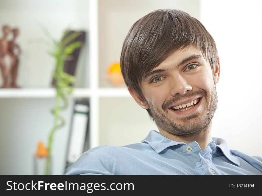 Cheerful and laughing man at home. Cheerful and laughing man at home