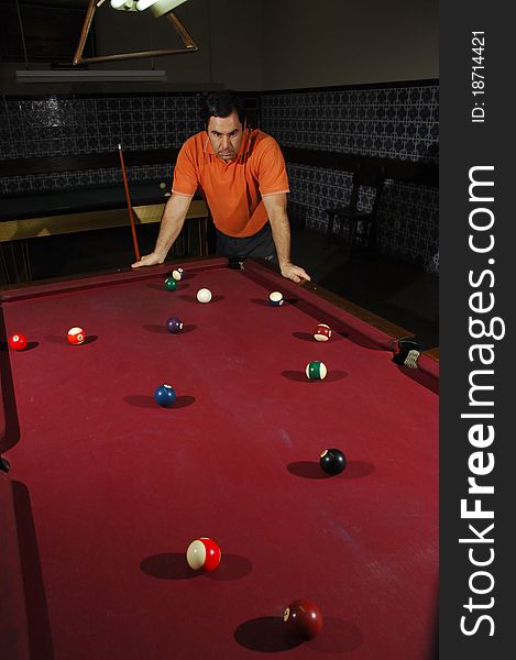 Person playing snooker