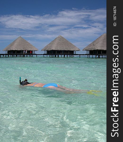 Beautiful Girl Snorkelling At Maldives