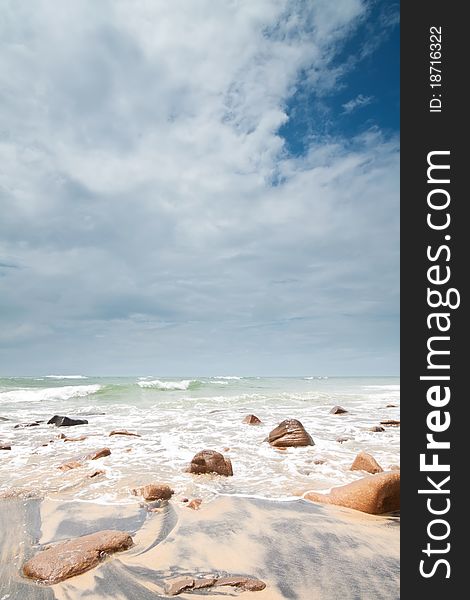 Rocks on the beach on vertical format (point arkwright,sunshine coast,australia). Rocks on the beach on vertical format (point arkwright,sunshine coast,australia)