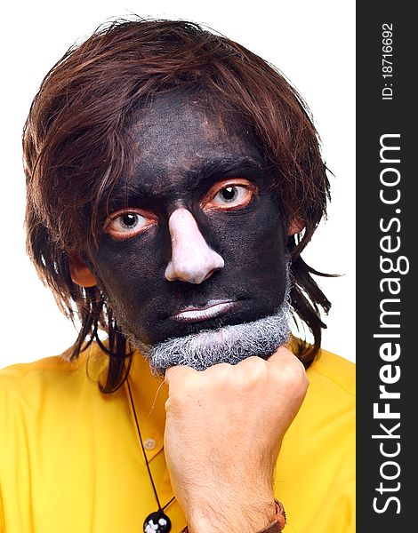 Portrait of a painted young man in studio. Portrait of a painted young man in studio