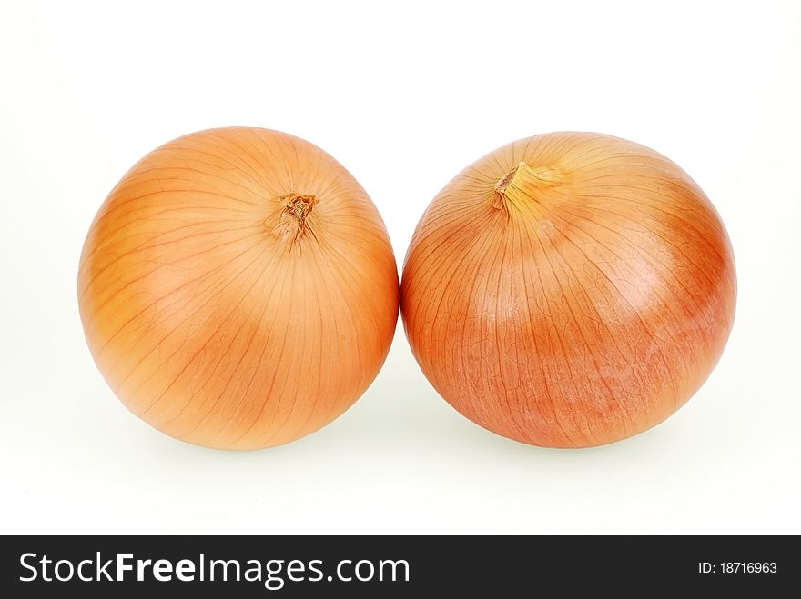 Isolated fresh onions on white background