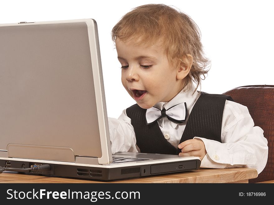 Little child and laptop Isolated on white background