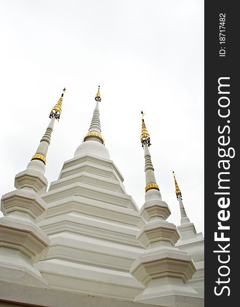 three tops of White pagoda on white background