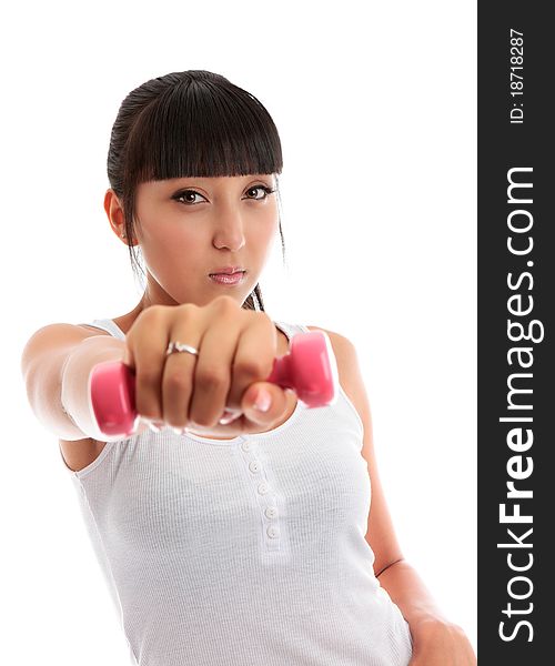 Beautiful young mixed race girl at the gym using hand weights.  She is looking directly at camera isolated on a white background. Beautiful young mixed race girl at the gym using hand weights.  She is looking directly at camera isolated on a white background.