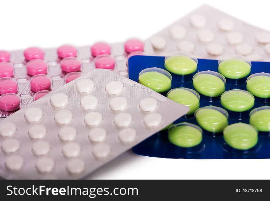 Packing pills isolated on a white background