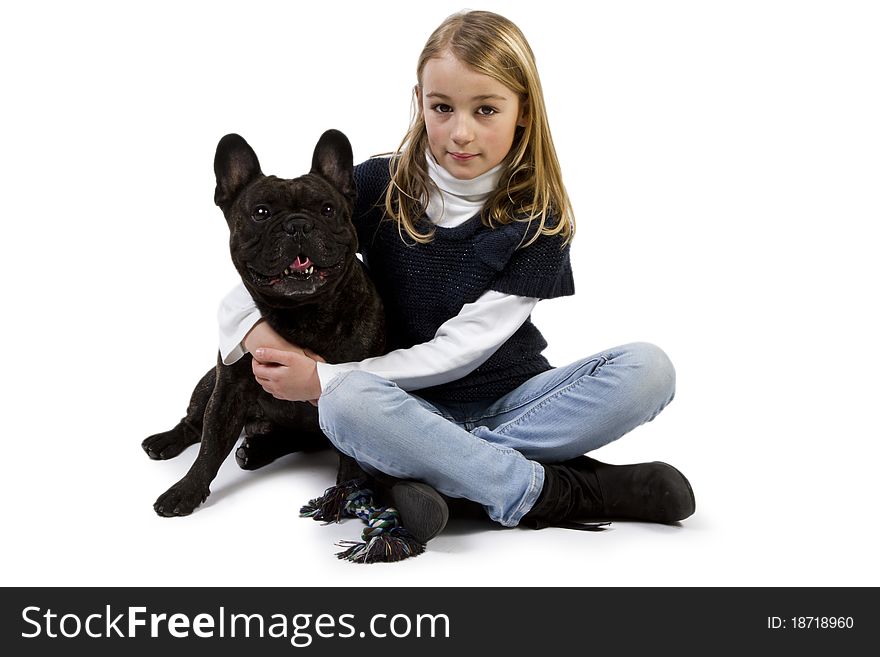 French bulldog and little girl playing