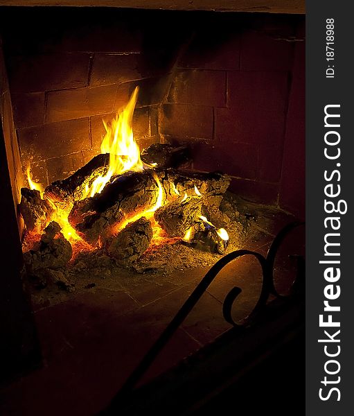 Logs burning in fireplace