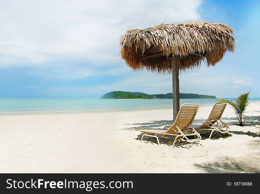 Chairs and umbrella on beach