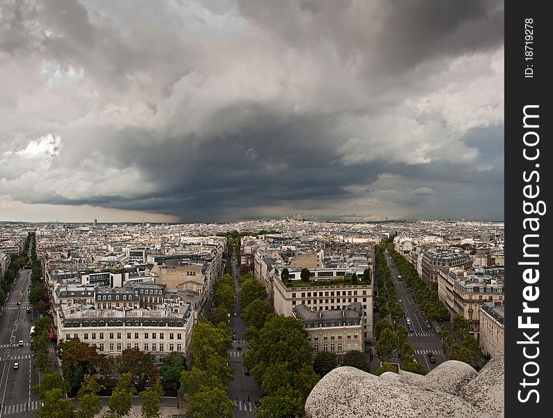 Paris aerial view with cloudy sky taken from Triumphal Arch in Monmartre direction. Paris aerial view with cloudy sky taken from Triumphal Arch in Monmartre direction