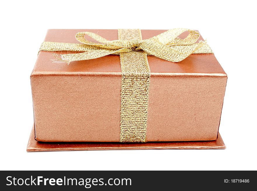 Gold gift box isolated on a white background