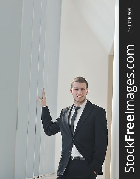 Young Business Man Alone In Conference Room