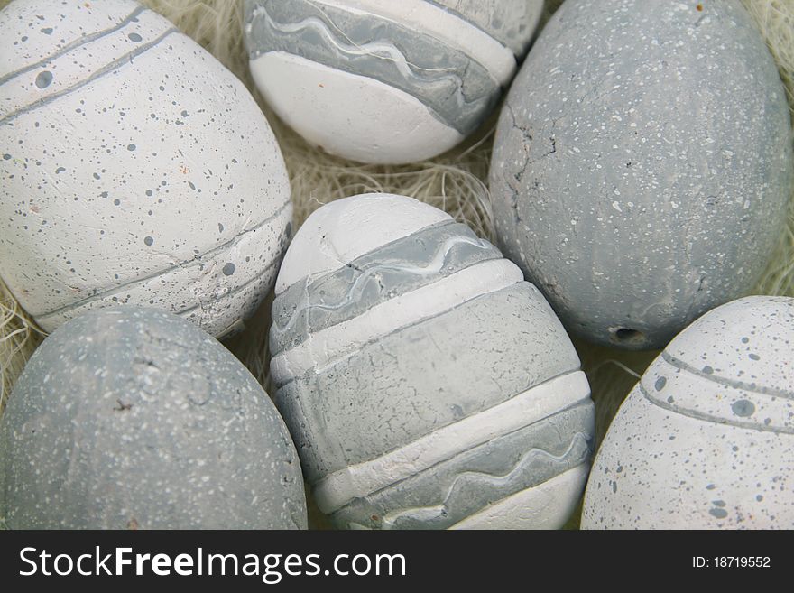 Blck/white/grey easter eggs in a nest. Blck/white/grey easter eggs in a nest.
