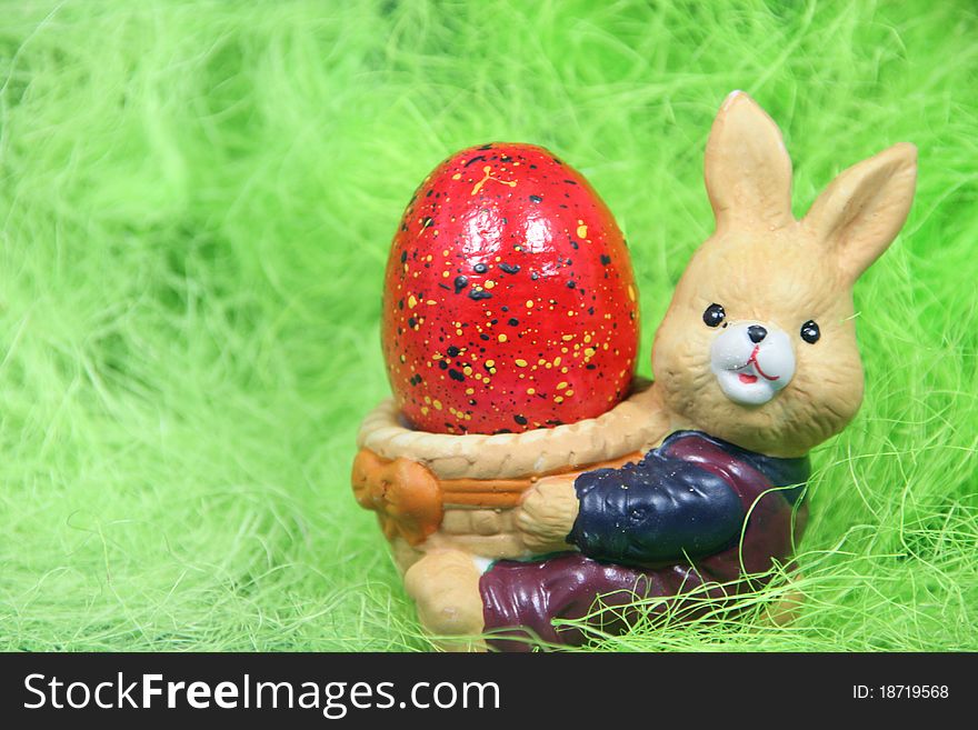 Cute easter bunny with eggs in a nest. Cute easter bunny with eggs in a nest.