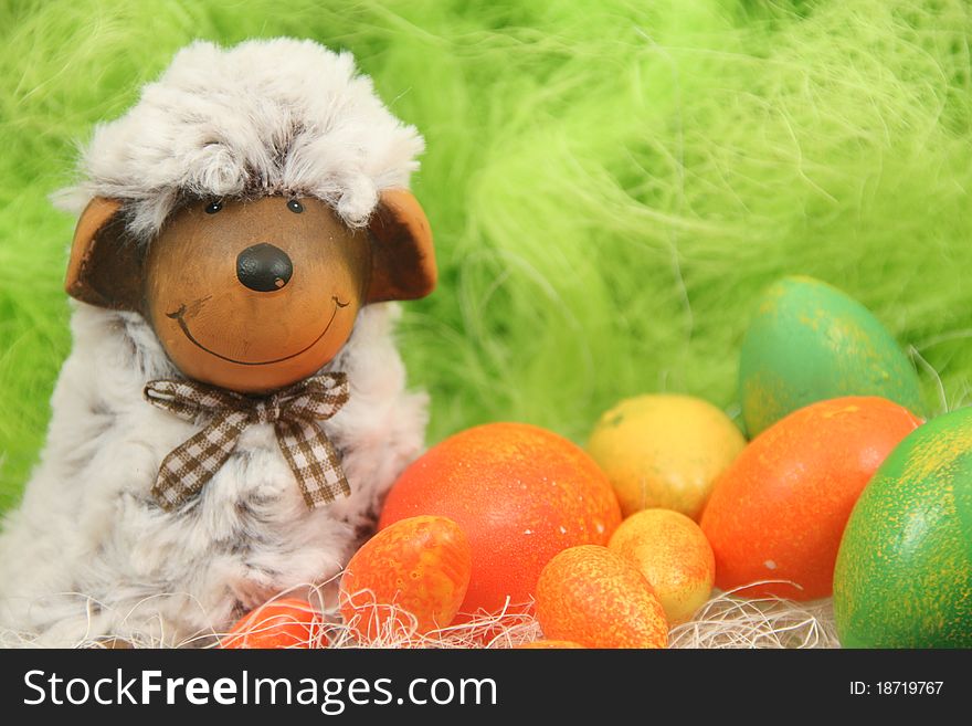 Cute easter sheep with eggs in a nest. Cute easter sheep with eggs in a nest.