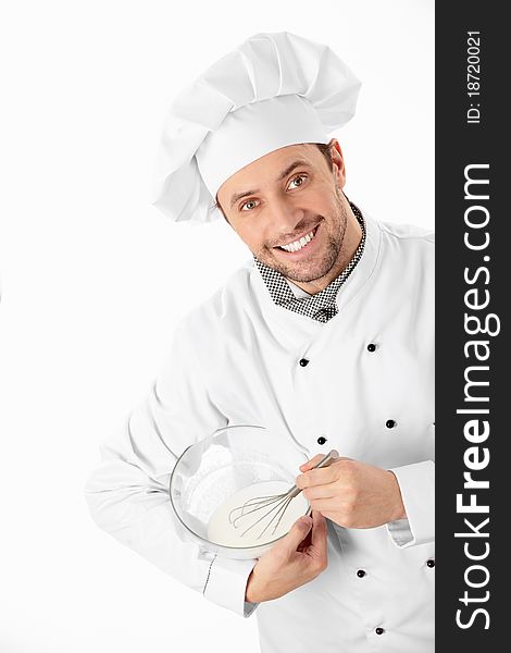 A cook prepares a white background. A cook prepares a white background