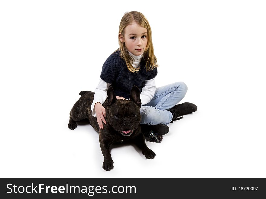 French bulldog and little girl playing