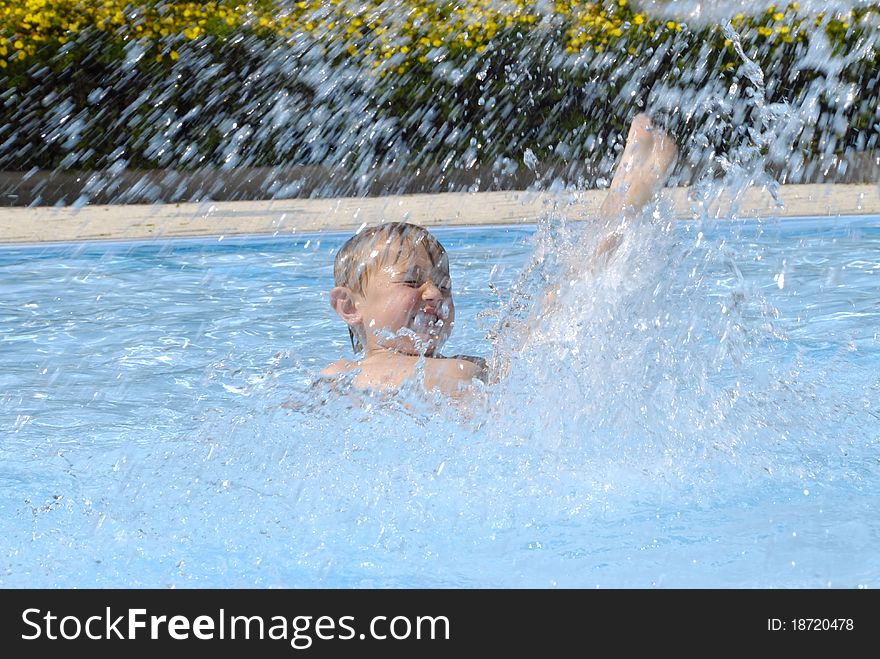 Blond boy in the pool.