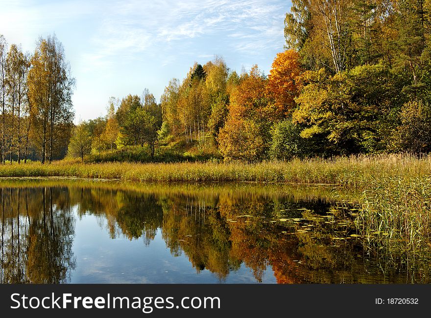 Autumn colors reflecting on the lake in south Estonia. Autumn colors reflecting on the lake in south Estonia