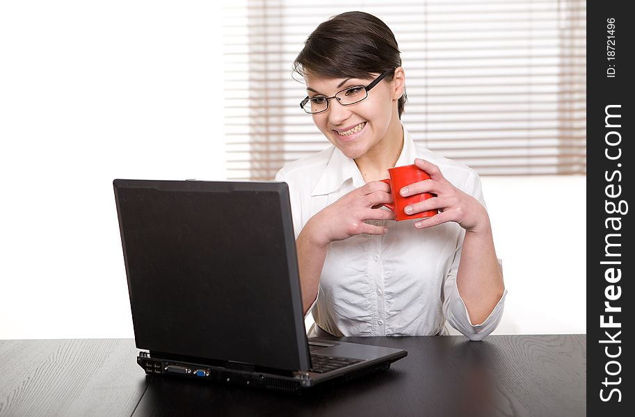Young adult businesswoman at desk