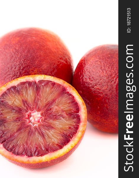 Three red oranges isolated on white backgroun